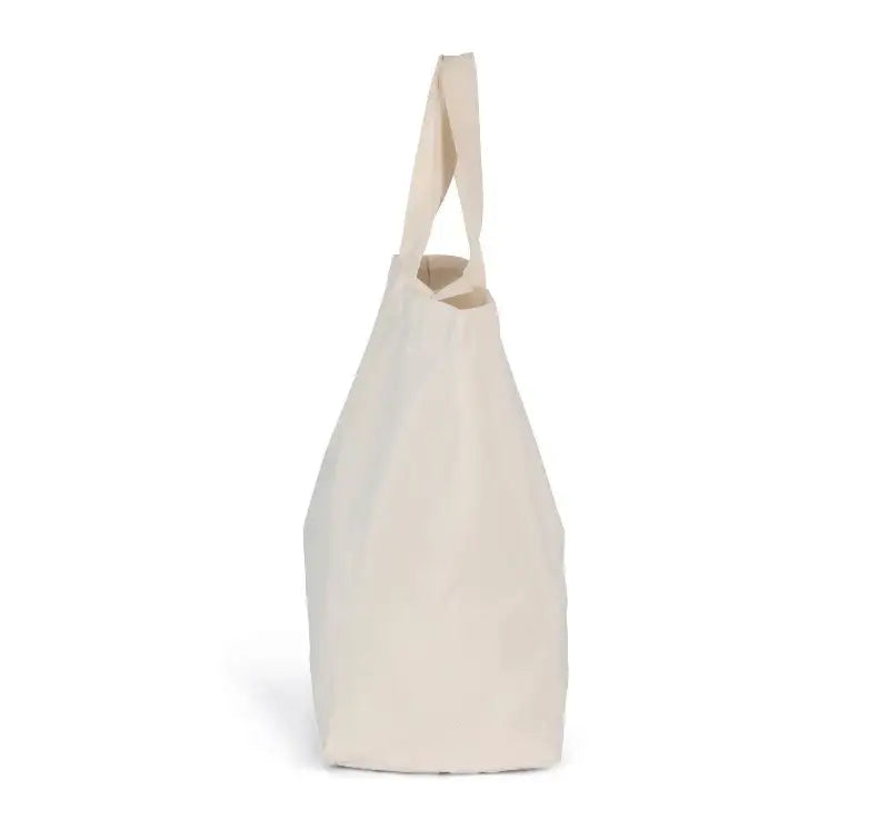 Natürliche Stofftasche aus Baumwolle, seitlich fotografiert, für nachhaltige Mode