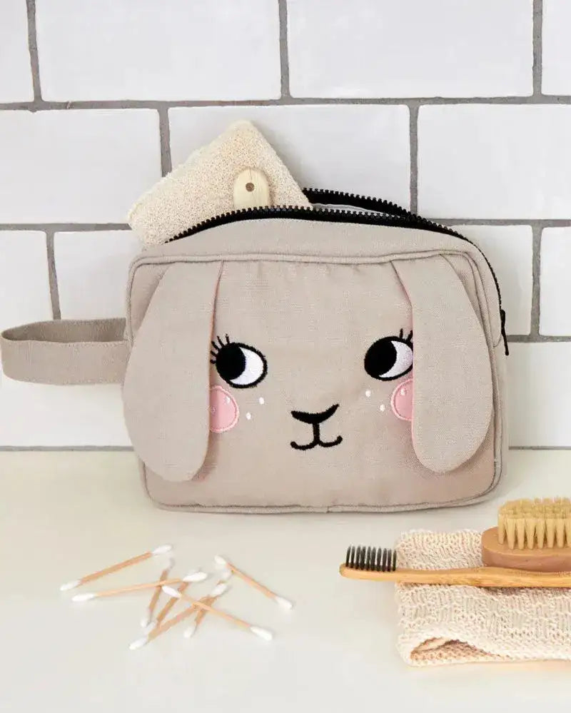 Beige Waschtasche mit Hasen-Gesicht und Ohren, Kinder-Kulturbeutel im Badezimmer