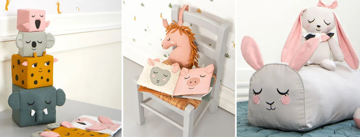 Nachhaltiges Kuschel-Spielzeug und Kissen in Tierform für Kinderzimmer auf Stuhl und Boden